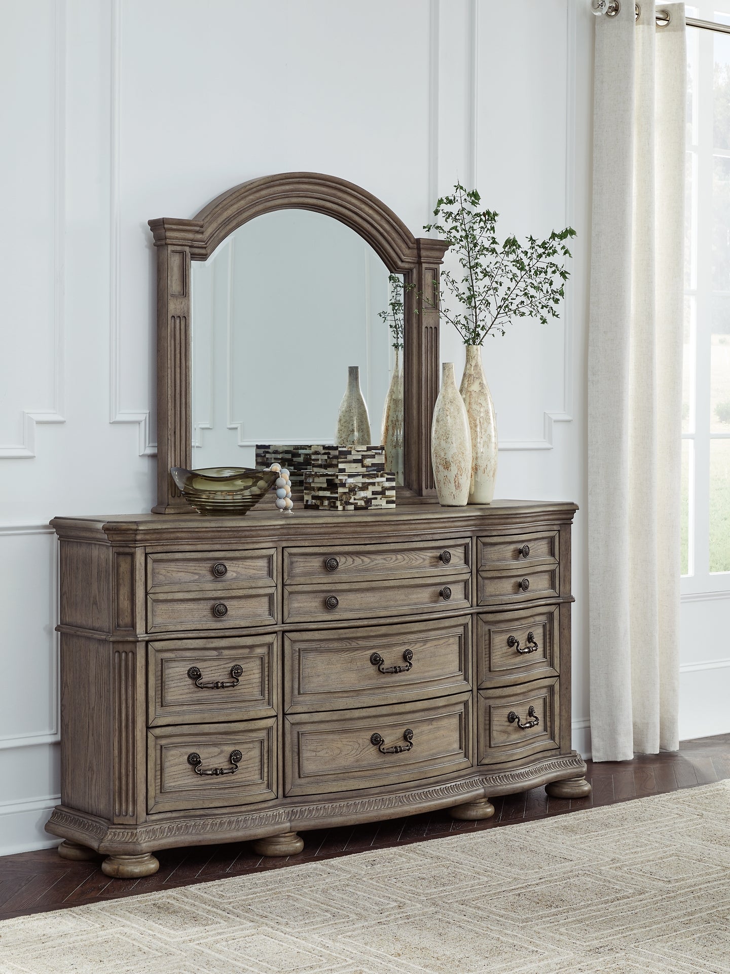 Ardenfield King Upholstered Sleigh Bed with Mirrored Dresser