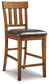 Ashley Express - Ralene Counter Height Dining Table and 6 Barstools