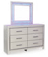 Zyniden King Upholstered Panel Headboard with Mirrored Dresser