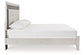 Zyniden King Upholstered Panel Bed with Mirrored Dresser