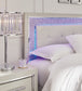 Zyniden King Upholstered Panel Headboard with Mirrored Dresser