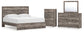 Ralinksi King Panel Bed with Mirrored Dresser and Chest