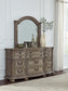 Ardenfield King Upholstered Sleigh Bed with Mirrored Dresser and Nightstand